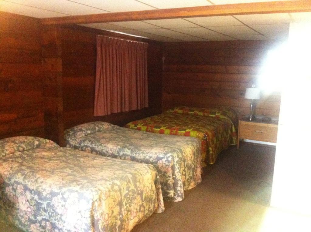 Raccoon Lodge Motel Sylvan Lake Zimmer foto